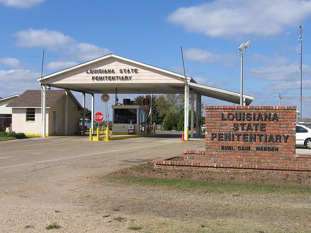 The entrance to the Louisiana State Penitentiary - The placard says "Louisiana State Penitentiary" and "Warden Burl Cain"