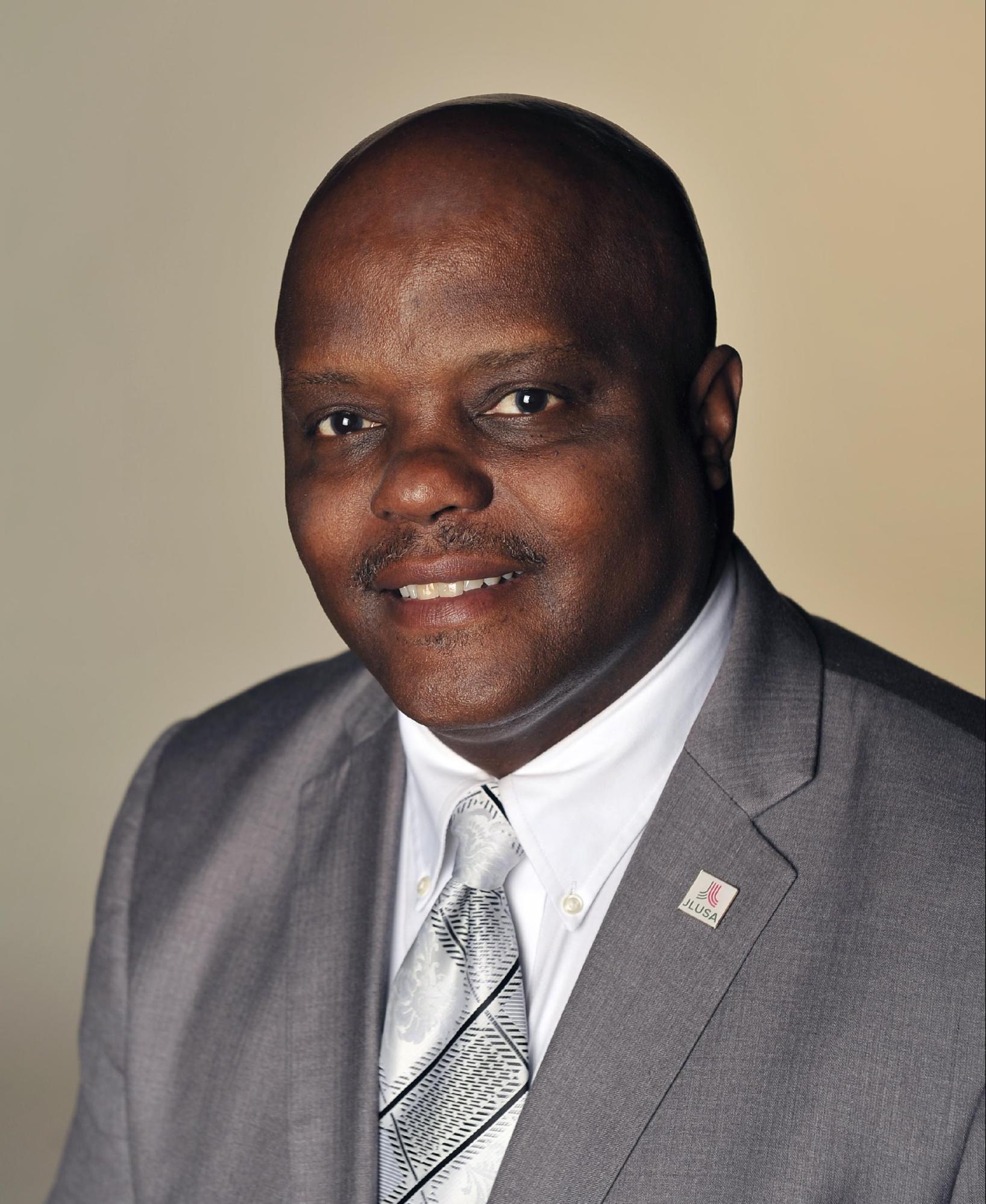 Headshot of Ronald D. Simpson-Bey.