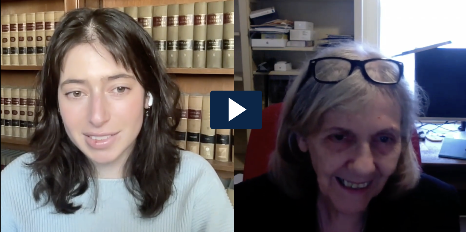 Screenshot of video interview, with law student Liz Lewis on left and attorney Elizabeth Alexander on right of screen, and a white arrow in a blue box in between them.