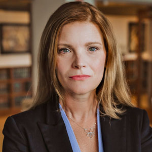 Headshot of Tricia Herzfeld.